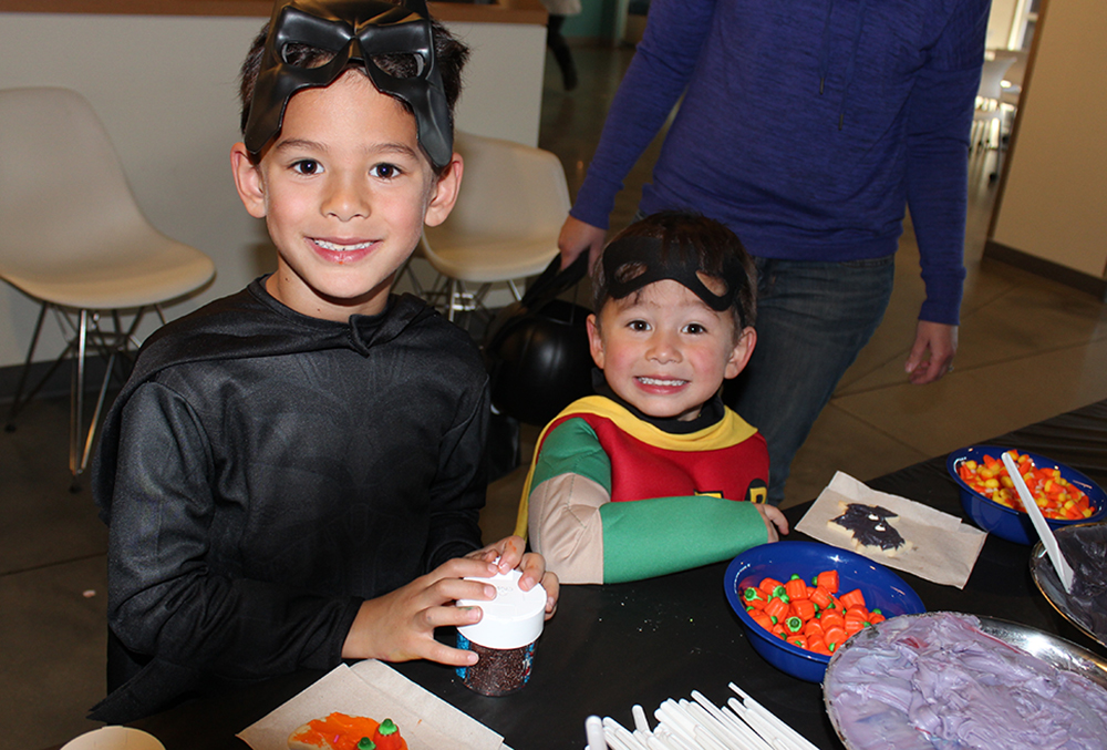 little boys dressed up as batman and robin