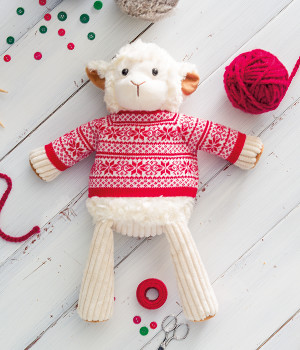Lenny the Lamb Scentsy buddy dressed in a red holiday sweater