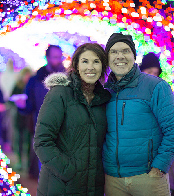 Photo of Heidi and Orville in the Scentsy tunnel of lights