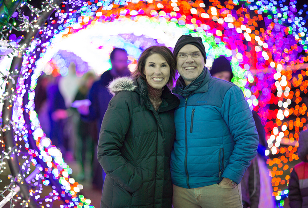 Photo of Heidi and Orville in the Scentsy tunnel of lights