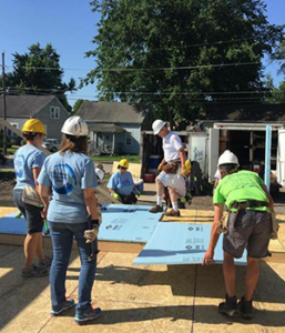 photo of habitat for humanity crew building home