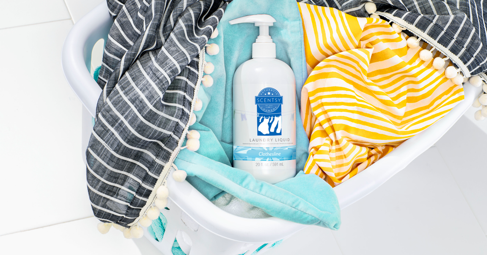 Photo of Scentsy Laundry Liquid the in Clothesline Fragrance in laundry basket