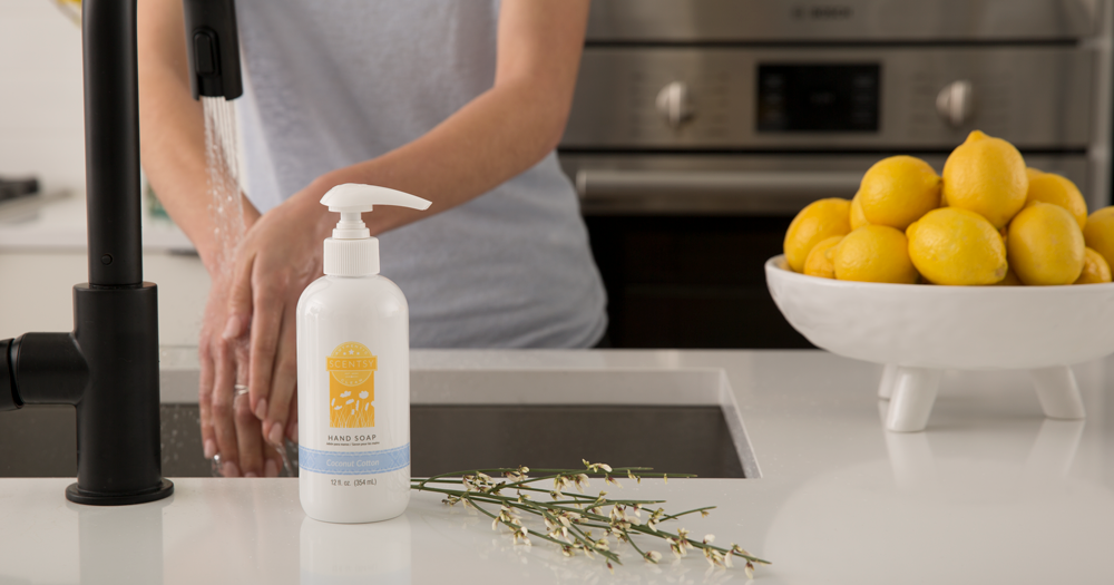 woman washing hands with Scentsy kitchen soap