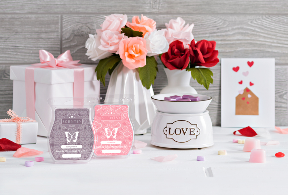 Photo of love warmer with pink haze and lucky in love setting on a valentine's themed table