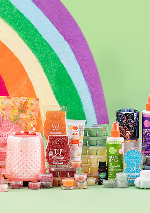 Scentsy products sitting at the end of a rainbow for St. Patrick's Day