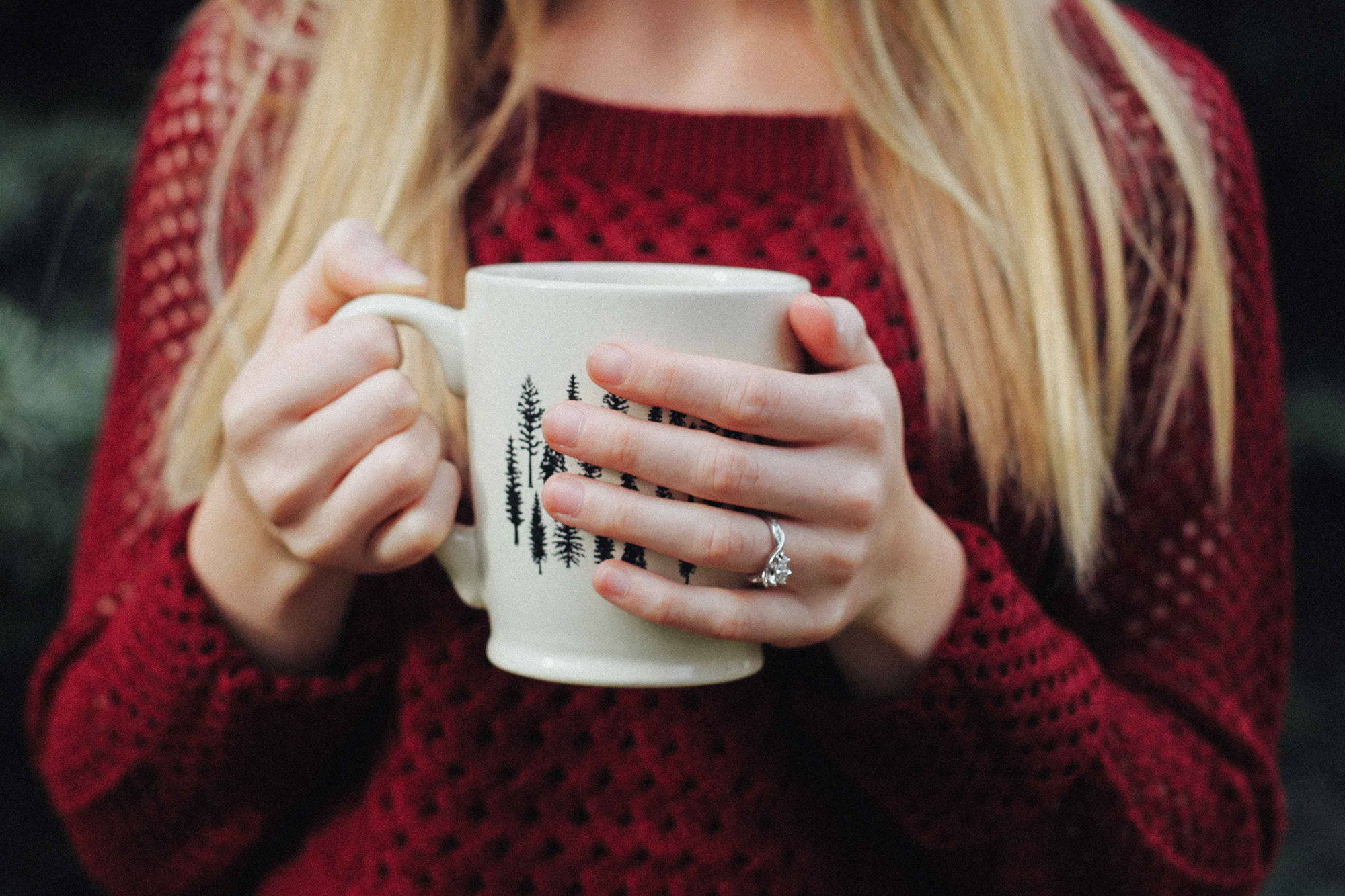 Photo of woman drinking hot coco
