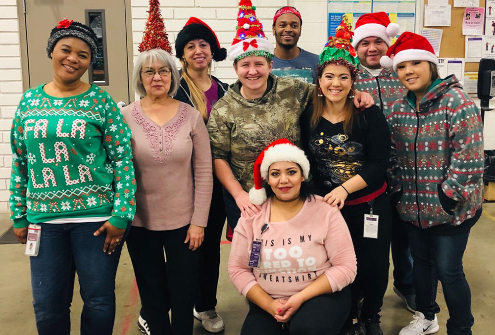 Photo of Scentsy Employees in their Holiday sweaters and hats