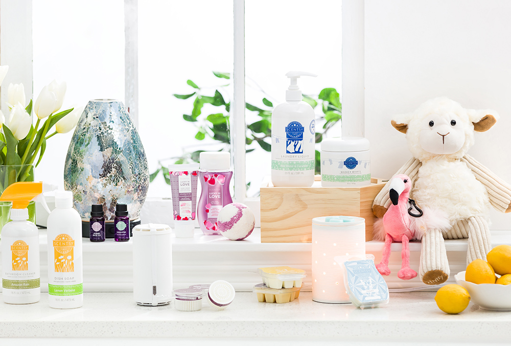 Collection of Scentsy products beyond warmers, from Scentsy go's, difficusers, buddies, laundry and body products