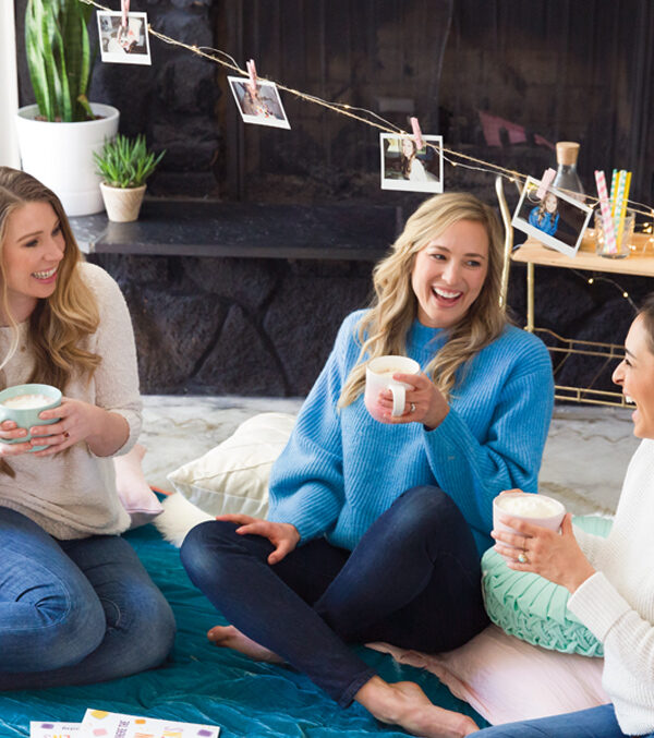 consultants laughing at a hygge themed scentsy party