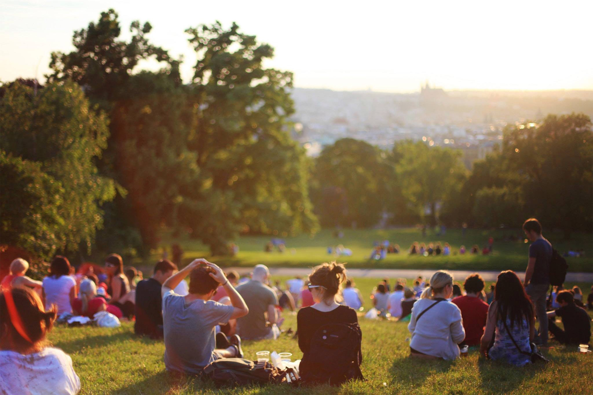 Families at the park looking towards the horizon 