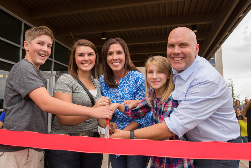 Heidi, Orville, and the kids open the Scentsy Commons