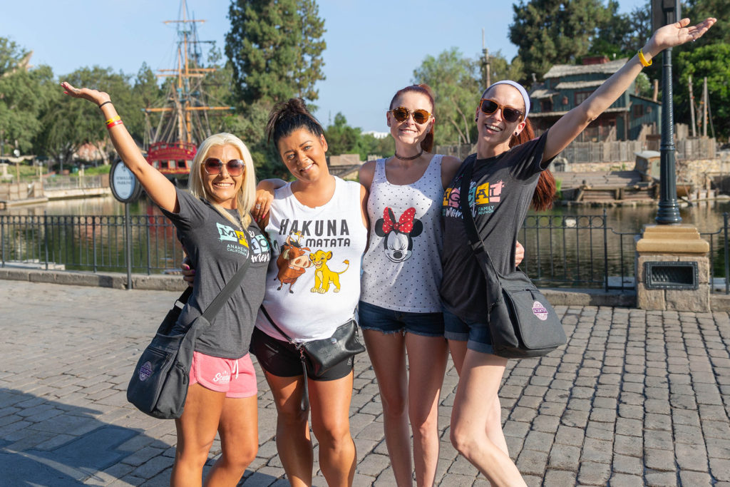 Consultants group photo early in the morning in front of Tom Sawyer Island at Disneyland California