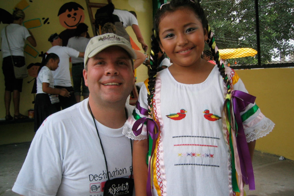 Photo of Orville with Student from Cancun Incentive Trip