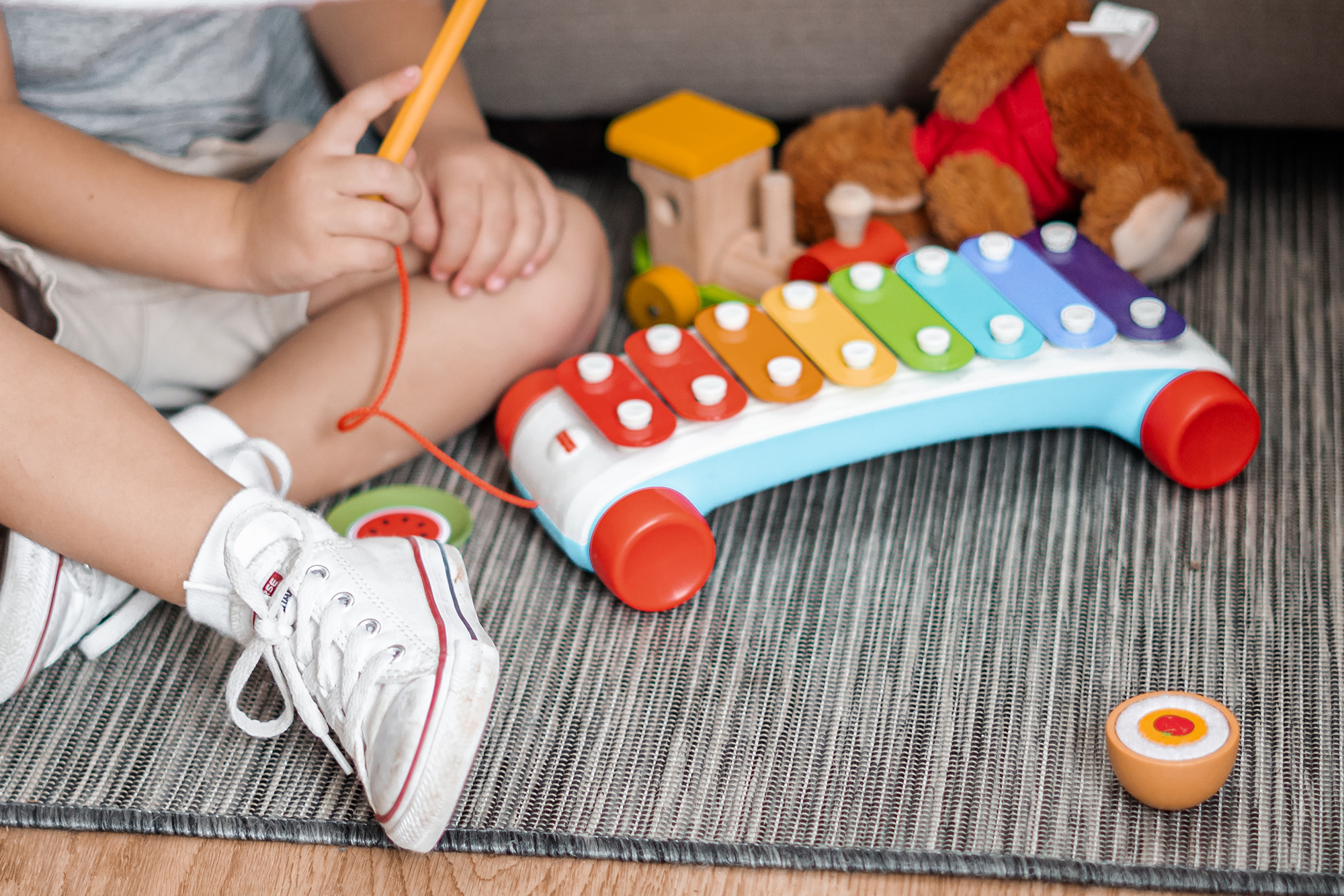 Child playing a xylophone