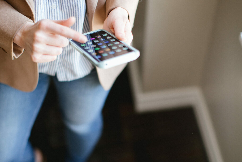 Woman using apps on her phone