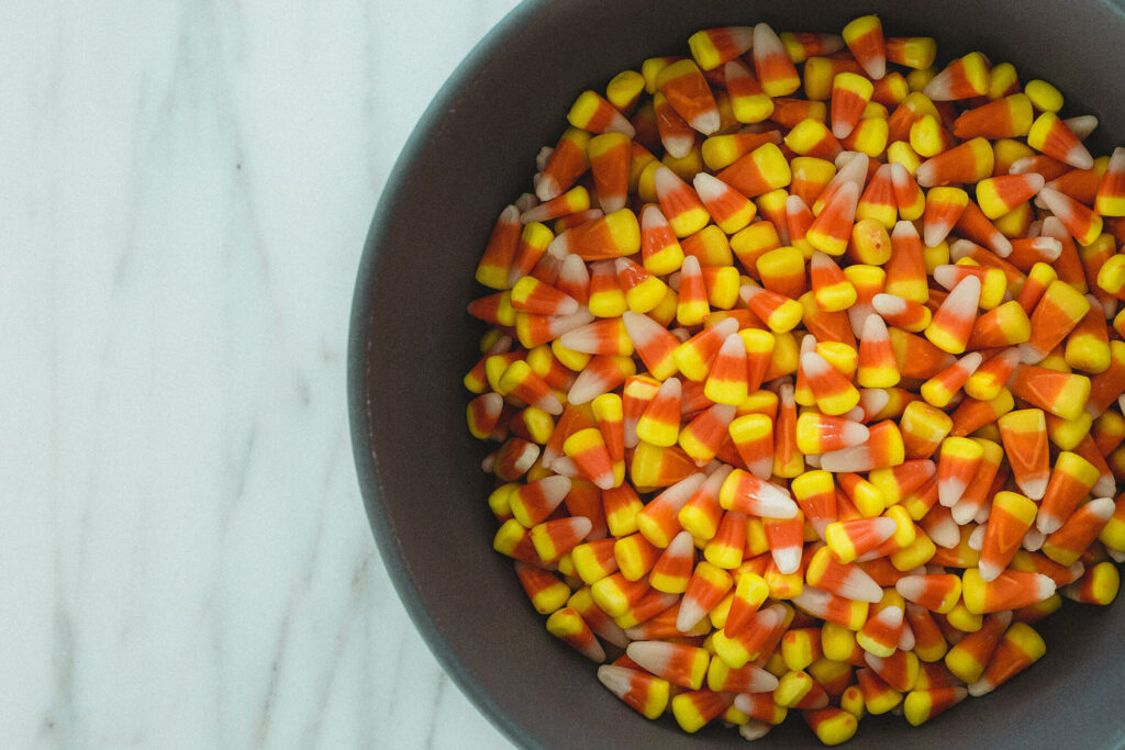 Bowl of candy corn on a counter top