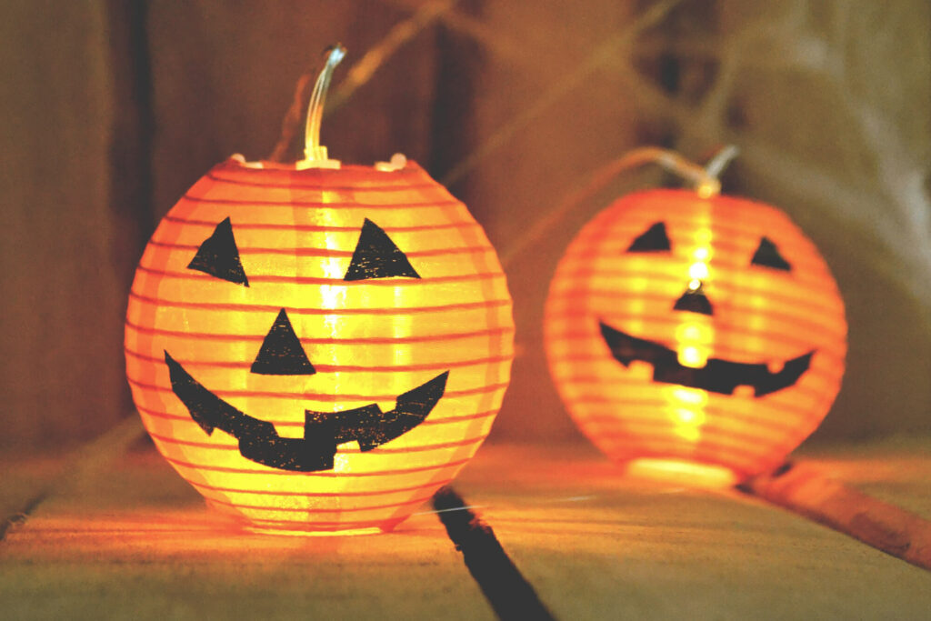 Glowing paper lantern jack-o-lanterns