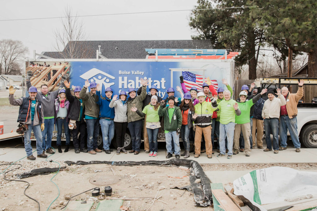 Scentsy employees group photo while volunteering for Habitat for Humanity
