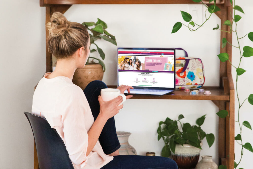 Scentsy Consultant using Workstation on her laptop to manage her home business