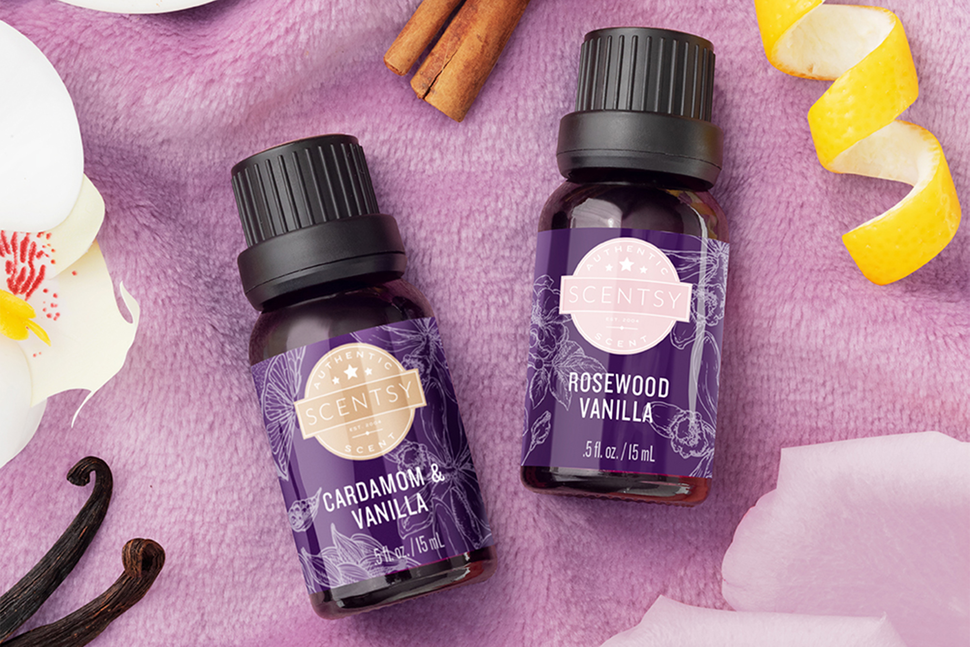 Scentsy's Cardamom & Vanilla oil and the Rosewood Vanilla oil with their ingredients