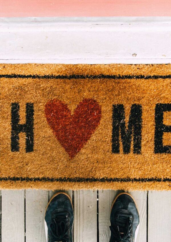Doormat that says "Home"
