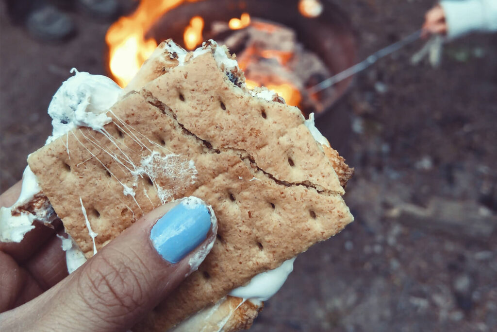 Woman holding a toasted s'more