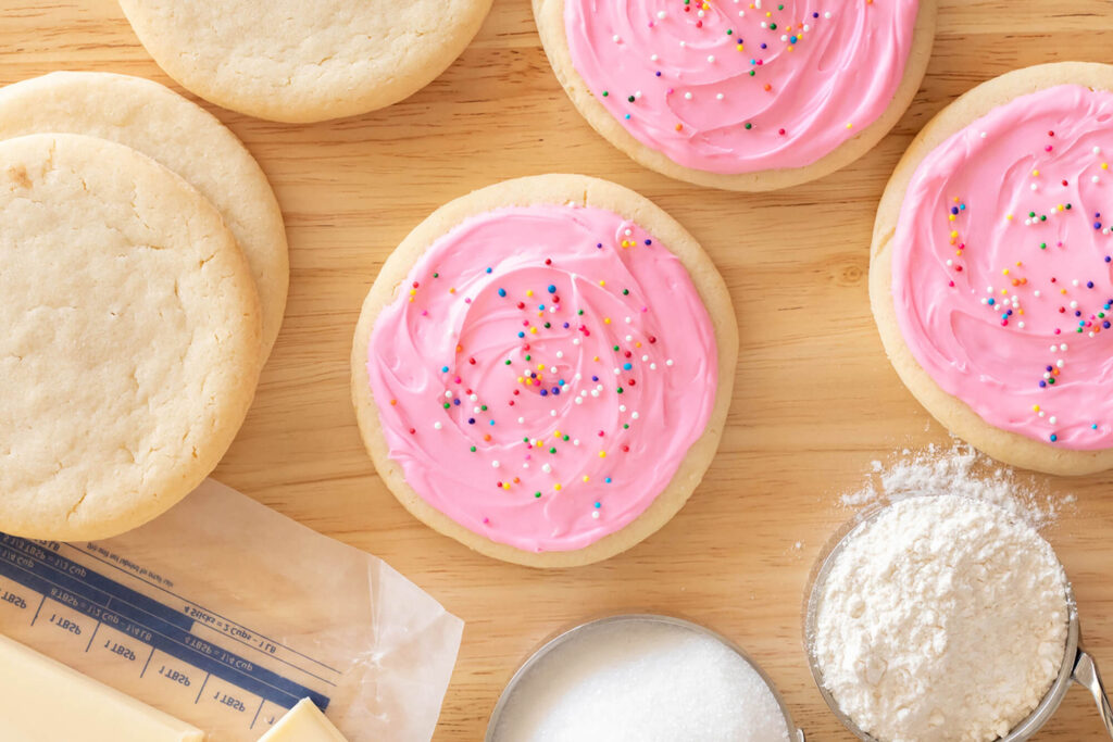 Simple sugar cookies surrounded by ingredients