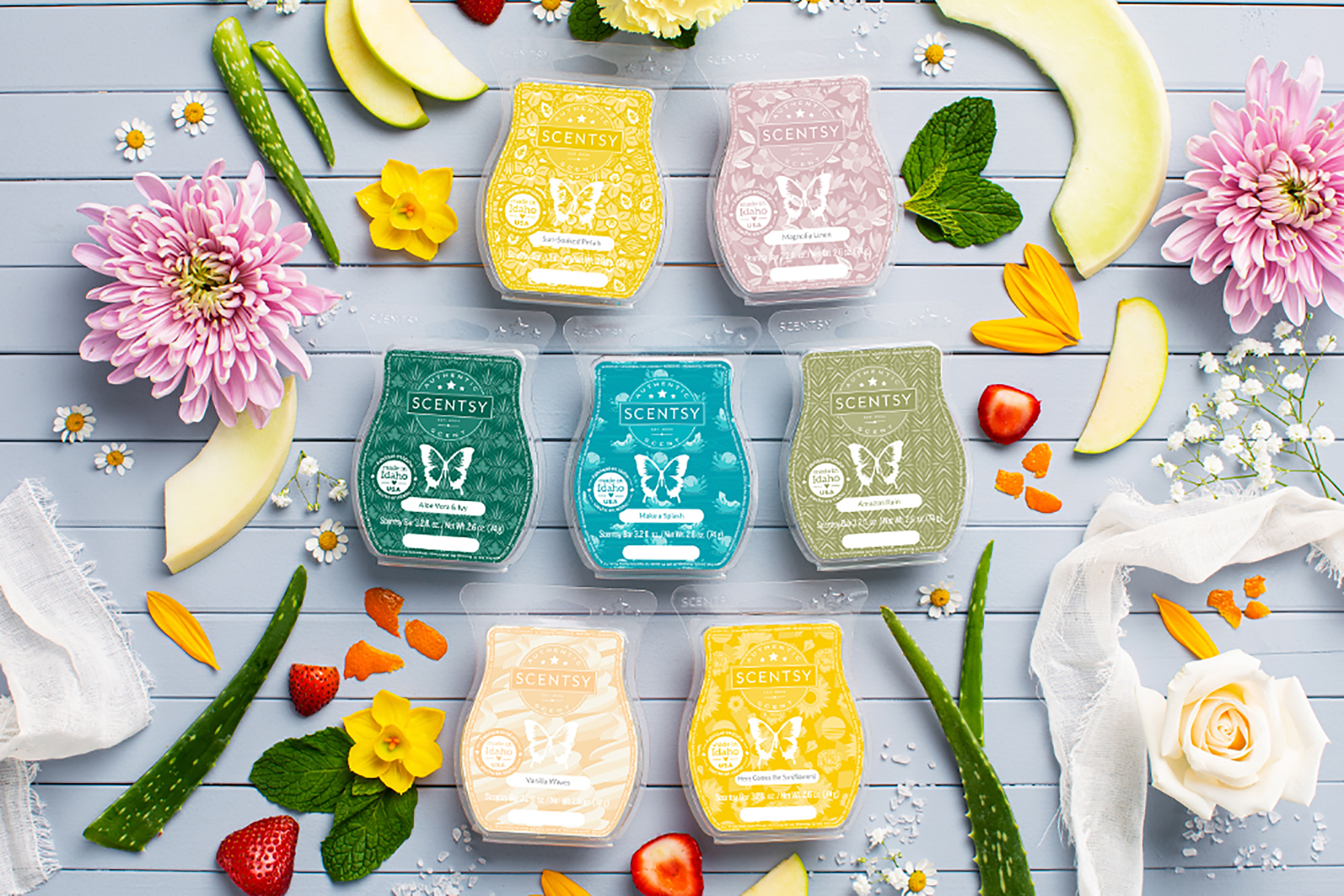 Scentsy celebrates International Fragrance Day with an image of various new Spring 2021 clamshells