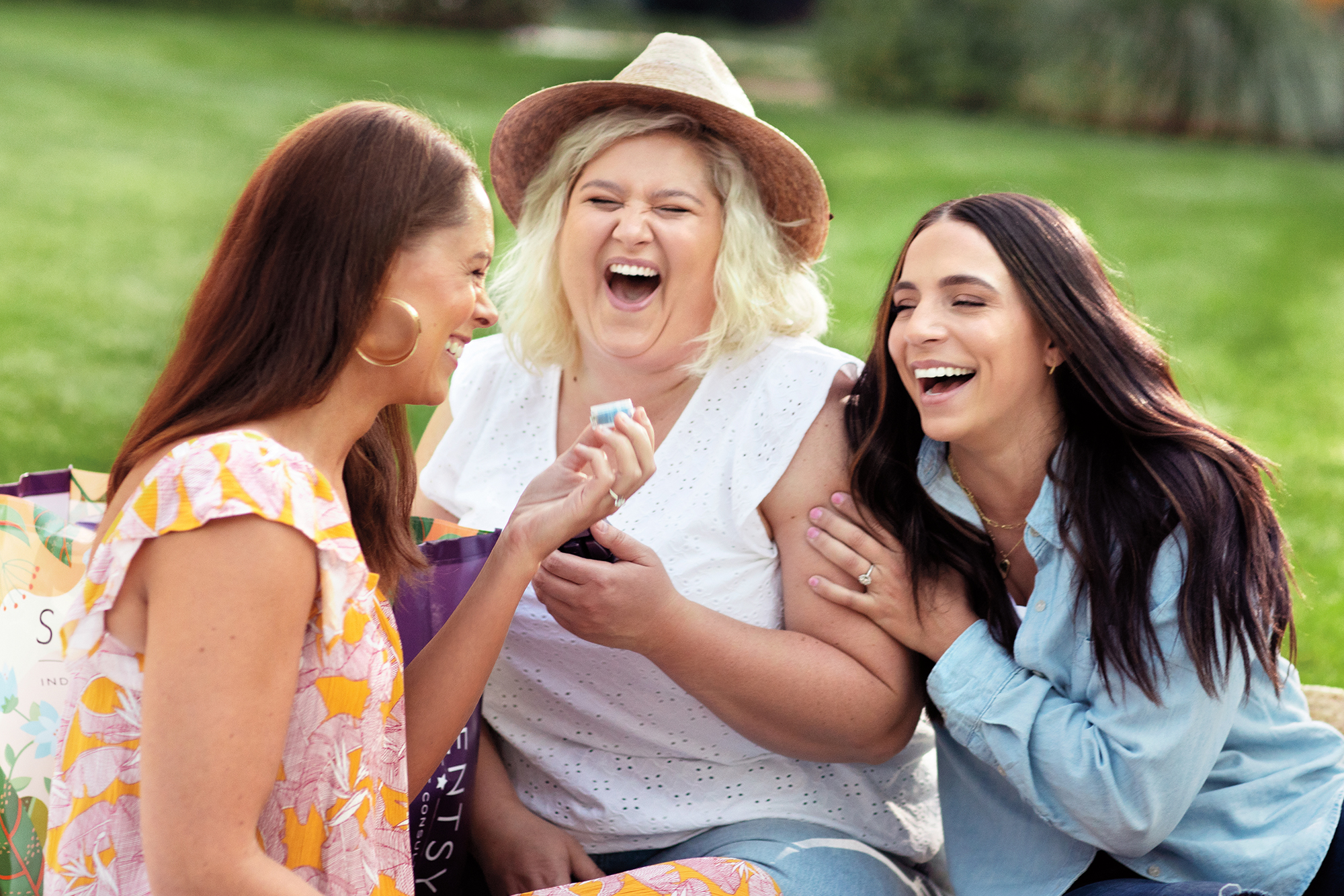 Scentsy Join Image - Three friends laughing and testing Scentsy products