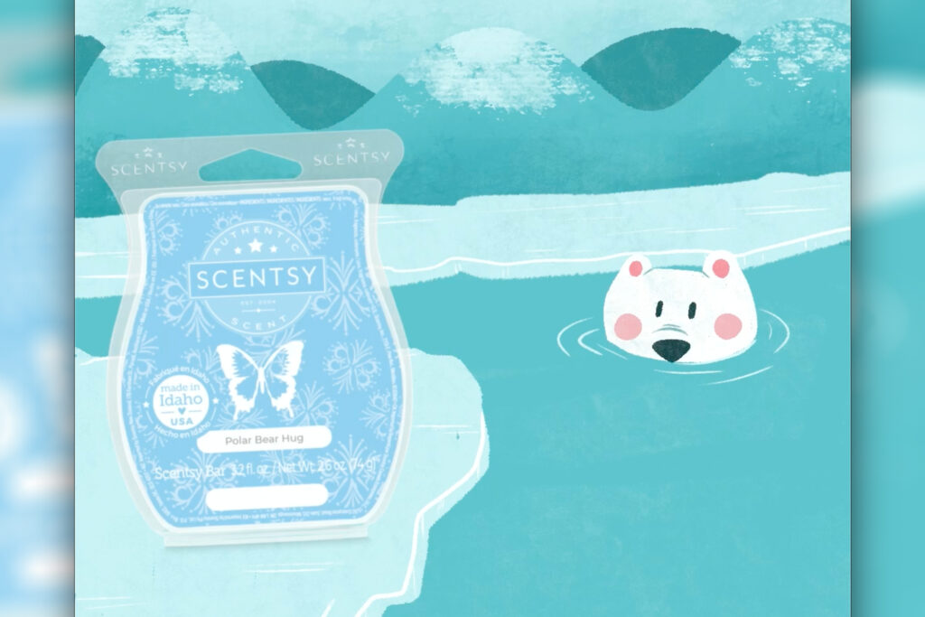 Scentsy wax bar scented in Polar Bear Hug fragrance sitting on an ice cap with a polar bear swimming in the cold arctic waters