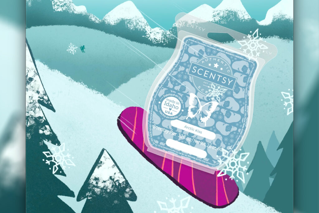 Scentsy Arctic Kiss scented wax melts on a snowboard going down the mountain