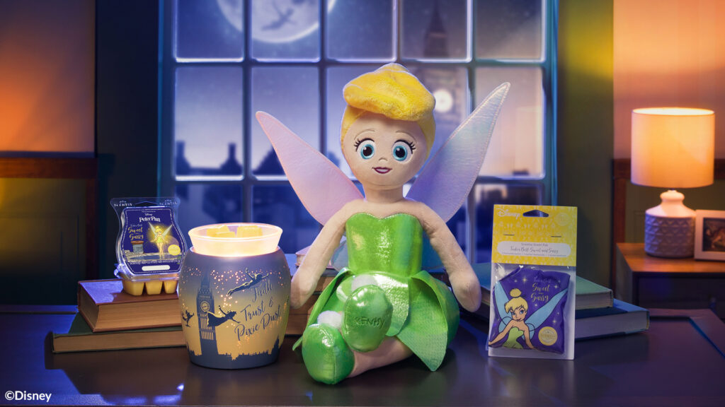 The Disney Peter Pan Collection at Scentsy including the Faith, Trust & Pixie Dust Wax Warmer, Tinker Bell stuffed animal buddy, sweet and sassy scented wax melts and scent pak