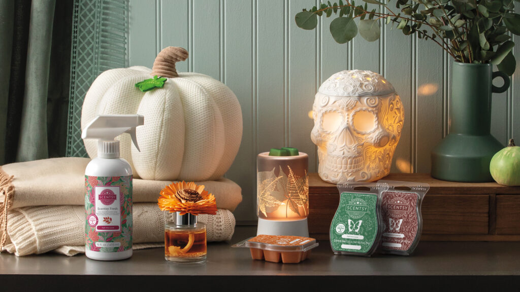 Scentsy Harvest collection products including Fall into Love Scentsy Fresh Fabric Spray, Calaverita skull wax warmer, Luminous leaves mini tabletop base wax warmer, Fall Into Love Stunning Sunflower Fragrance Flower, Lumina Pumpkin Darling Décor and 3 wax melts bars scented in fall fragrance