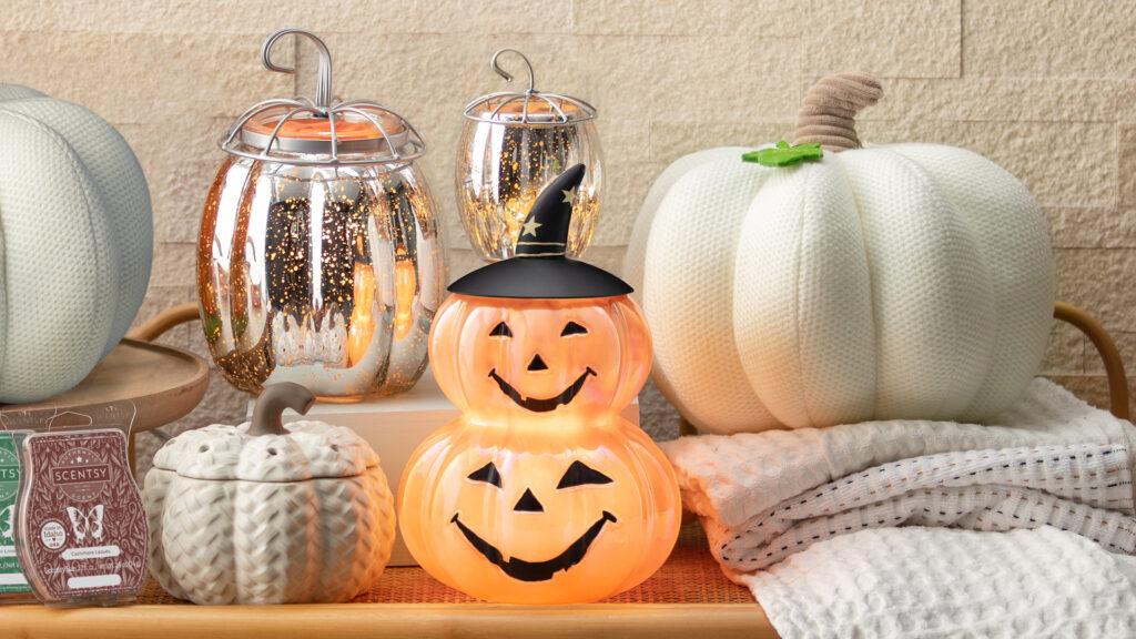 Scentsy Harvest collection products including Fall Fairy Tale Wax Warmer, Fall Fairy Tale Pumpkin Mini Warmer, Harvest Bounty Wax Warmer, Witch O’Lantern Warmer, Lumina Pumpkin Darling Décor and wax melts bars scented in fall fragrance.