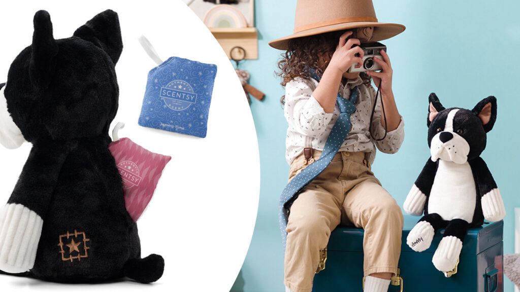 A child dressed up with a tie and fedora taking a photo of a dog scentsy buddy with a photo beside showing how scent paks go into the back of the buddy