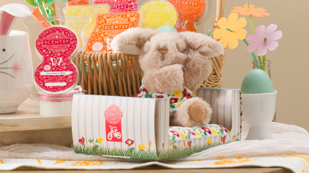 A Rhubarb the Rabbit Scentsy Beddy-Bye Buddy scented in our Pink Rhubarb Sugar fragrance with easter decor and scentsy easter products including Hop To It Tabletop Fan Diffuser, easter wax bar bundle and scent pods