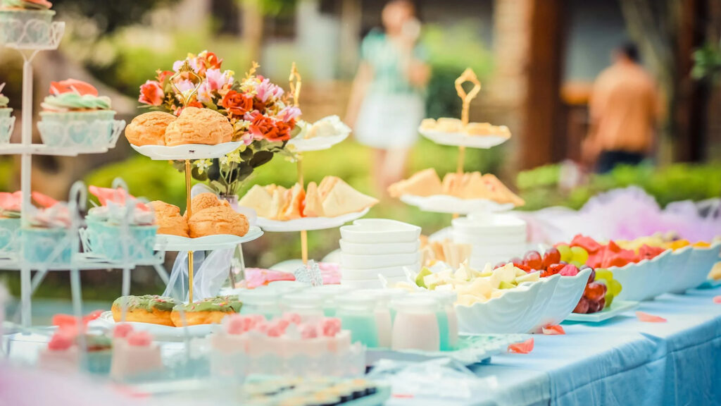 A table full of graduation party food and snacks