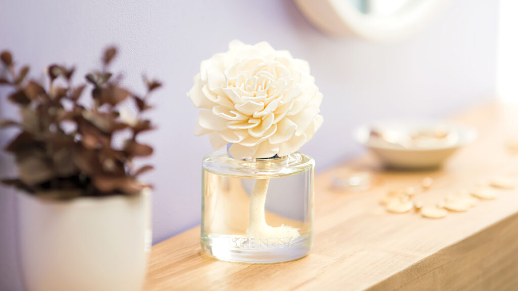 Scentsy Dahlia Darling fragrance flower displayed on a shelf.