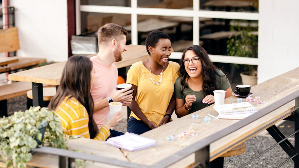 A group of friends gather for a Scentsy fragrance smelling party.