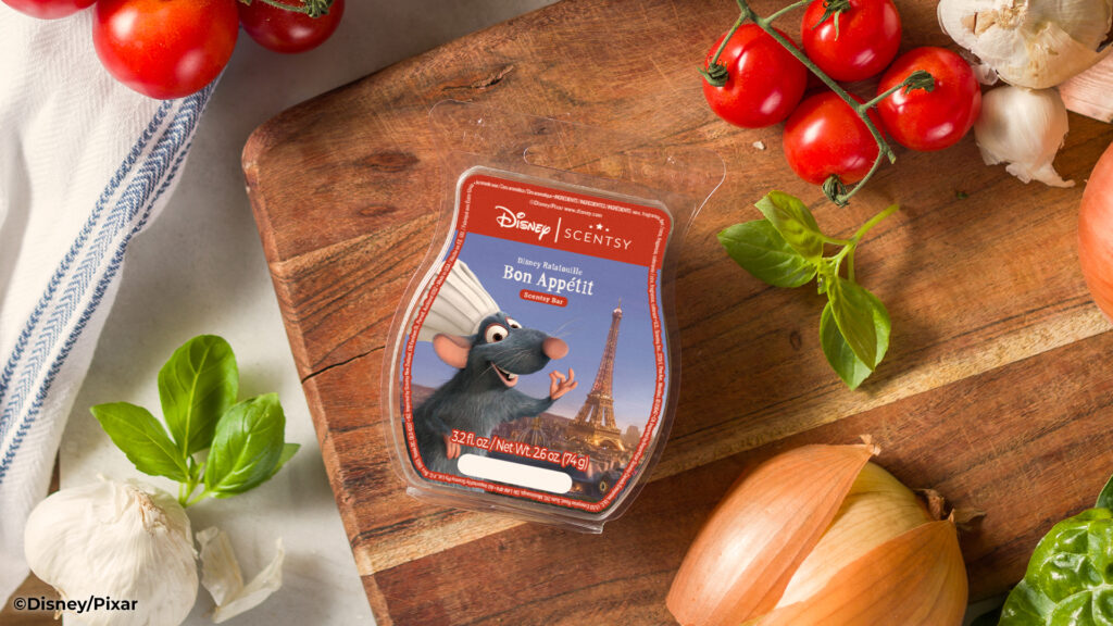 Disney Ratatouille: Bon Appétit – Scentsy Bar lying on a cutting board surrounded by fragrance notes and ingredients.