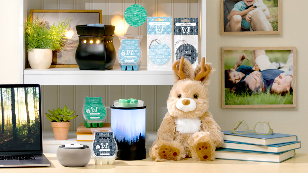 The Scentsy Father's Day collection staged upon a writing desk