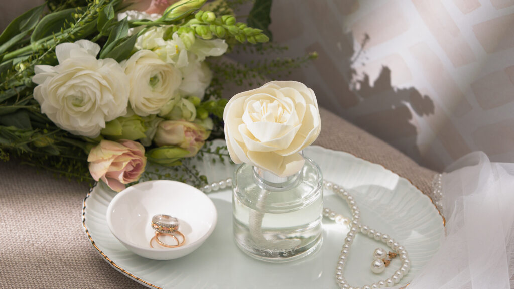 Scentsy fragrance flower used as a display piece on a wedding table