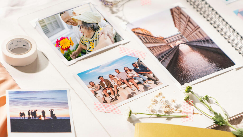 A page from a scrapbook full of photographs depicting a romantic summer getaway.