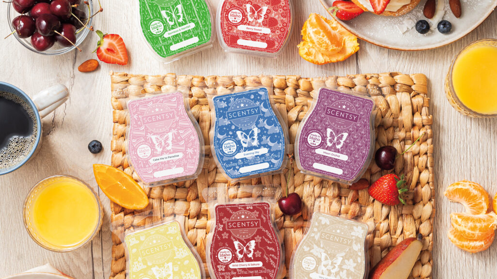 Scentsy wax bars from our Summer Collection surrounded by associated fruity fragrance notes.