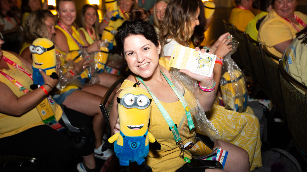 A consultant poses with her new Minion Kevin Scentsy Buddy while attending the Scentsy Family Reunion conference.