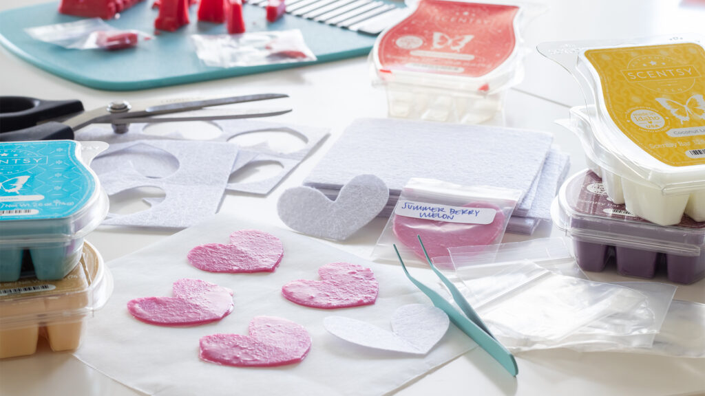 Scentsy wax being melted and formed into heart shapes.