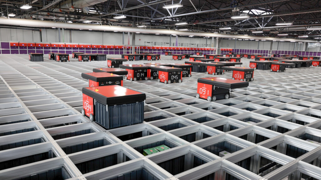 A photo of Scentsy automated cart robots functioning and the Scentsy packaging plant.