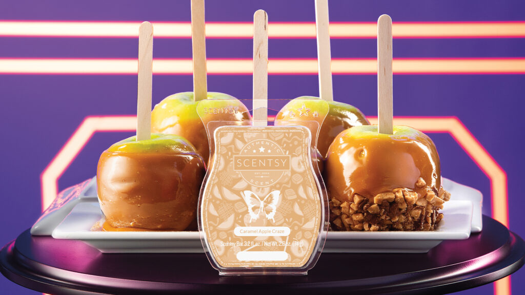 Scentsy Carmel Apple Craze posed with caramel dipped apples