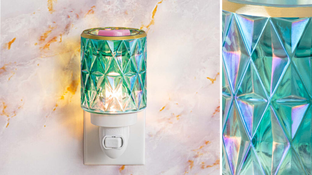 A detail photograph showing off the geometric and symmetrical patterns of the Crowned in Gold Scentsy Mini Warmer