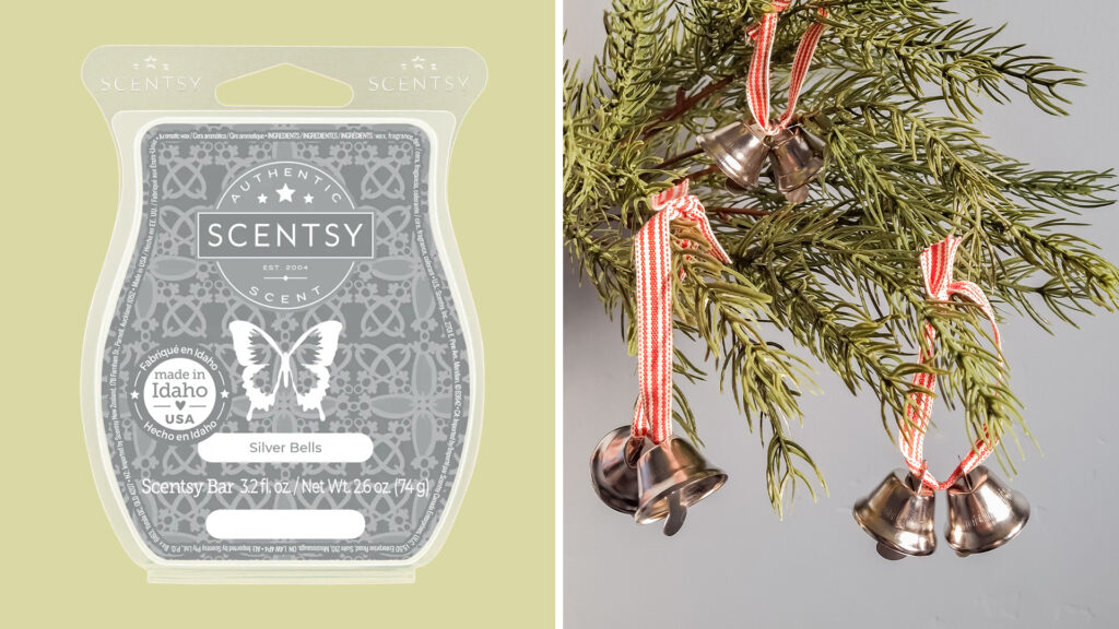 The Scentsy Silver Bells Wax Bar next to silver bell ornaments dangling from a Christmas tree. 